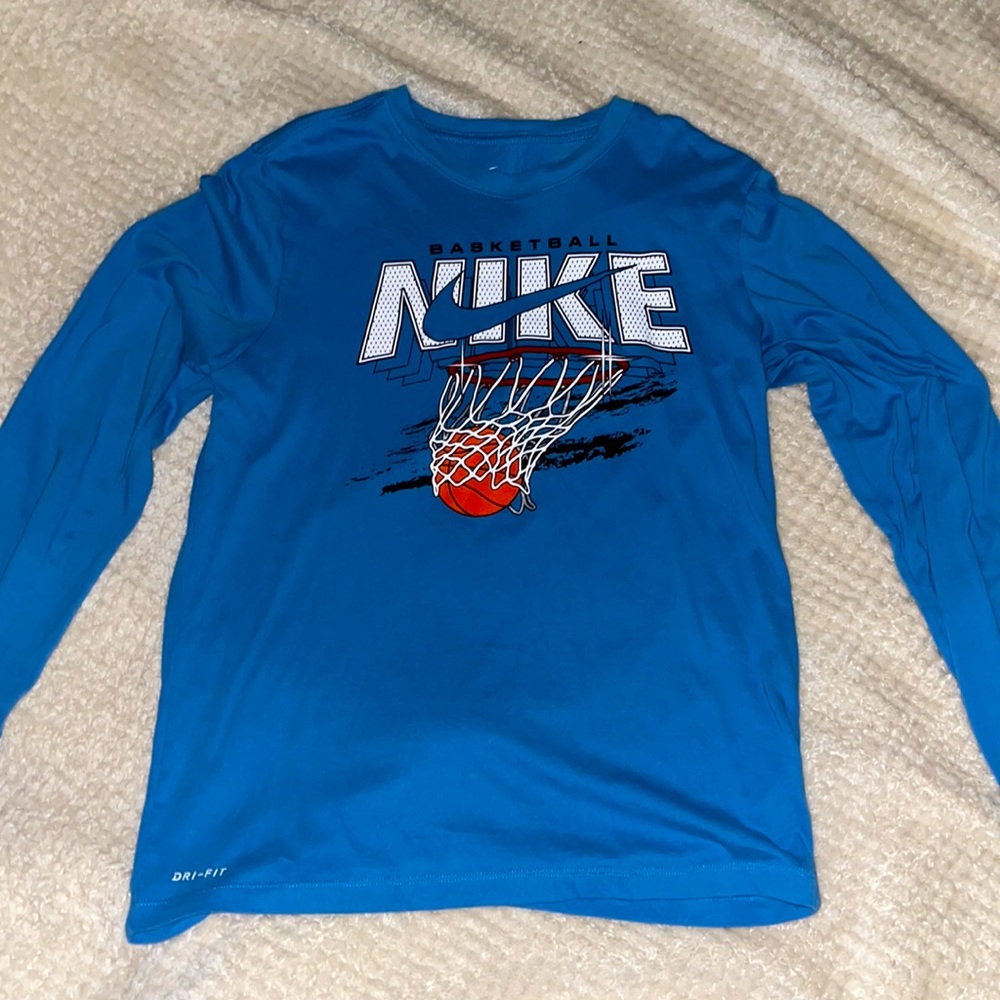 Blue nike basketball long sleeve shirt. Size medium Nike Dri-Fit